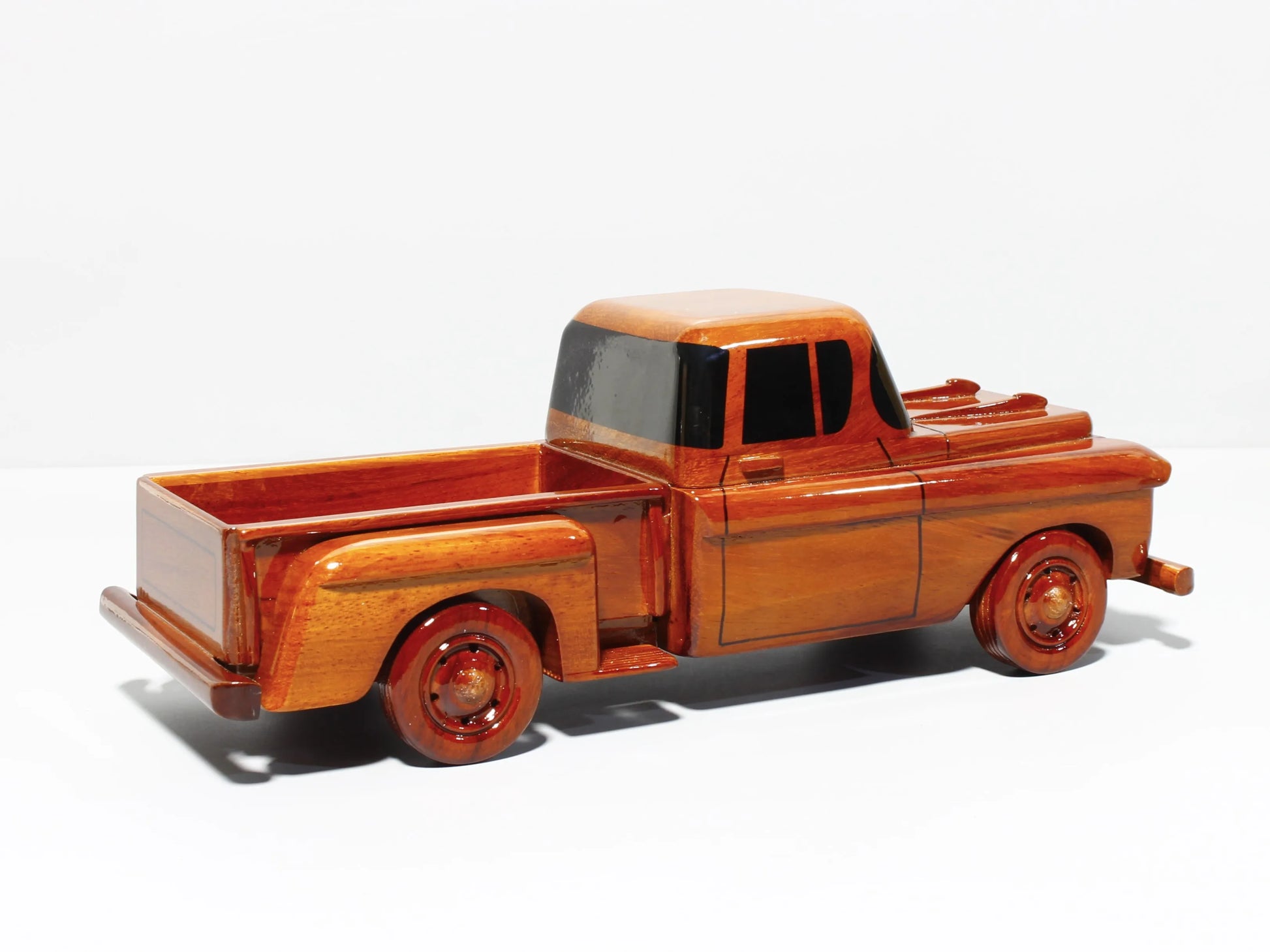 Vintage 1957 Ford pickup model – rear three-quarter view in mahogany finish