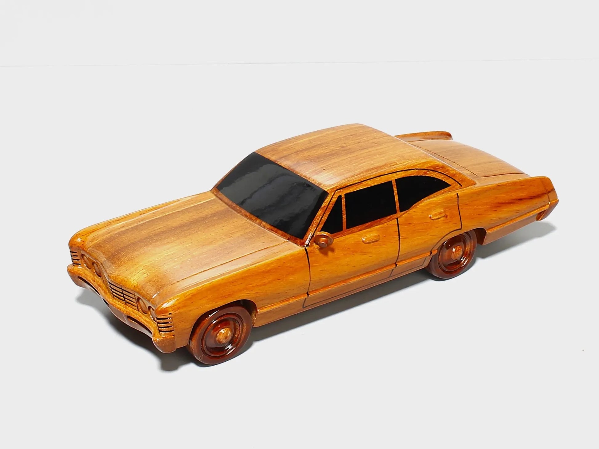 Chevy Impala wooden replica – front right view showcasing grille and curves