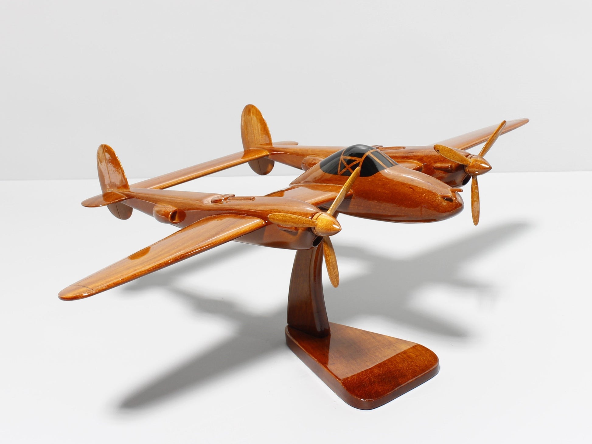 P-38 wooden model airplane with display stand