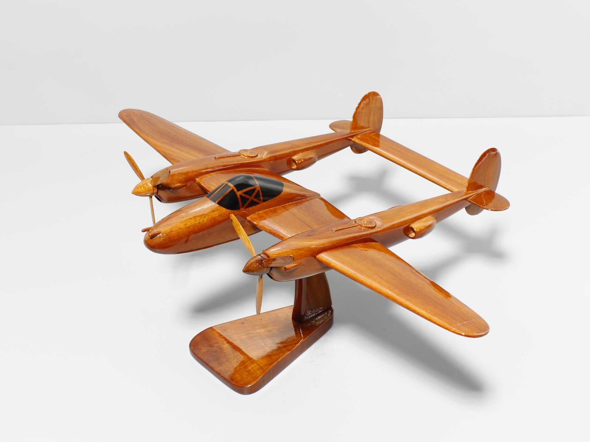 P-38 wooden model airplane with display stand