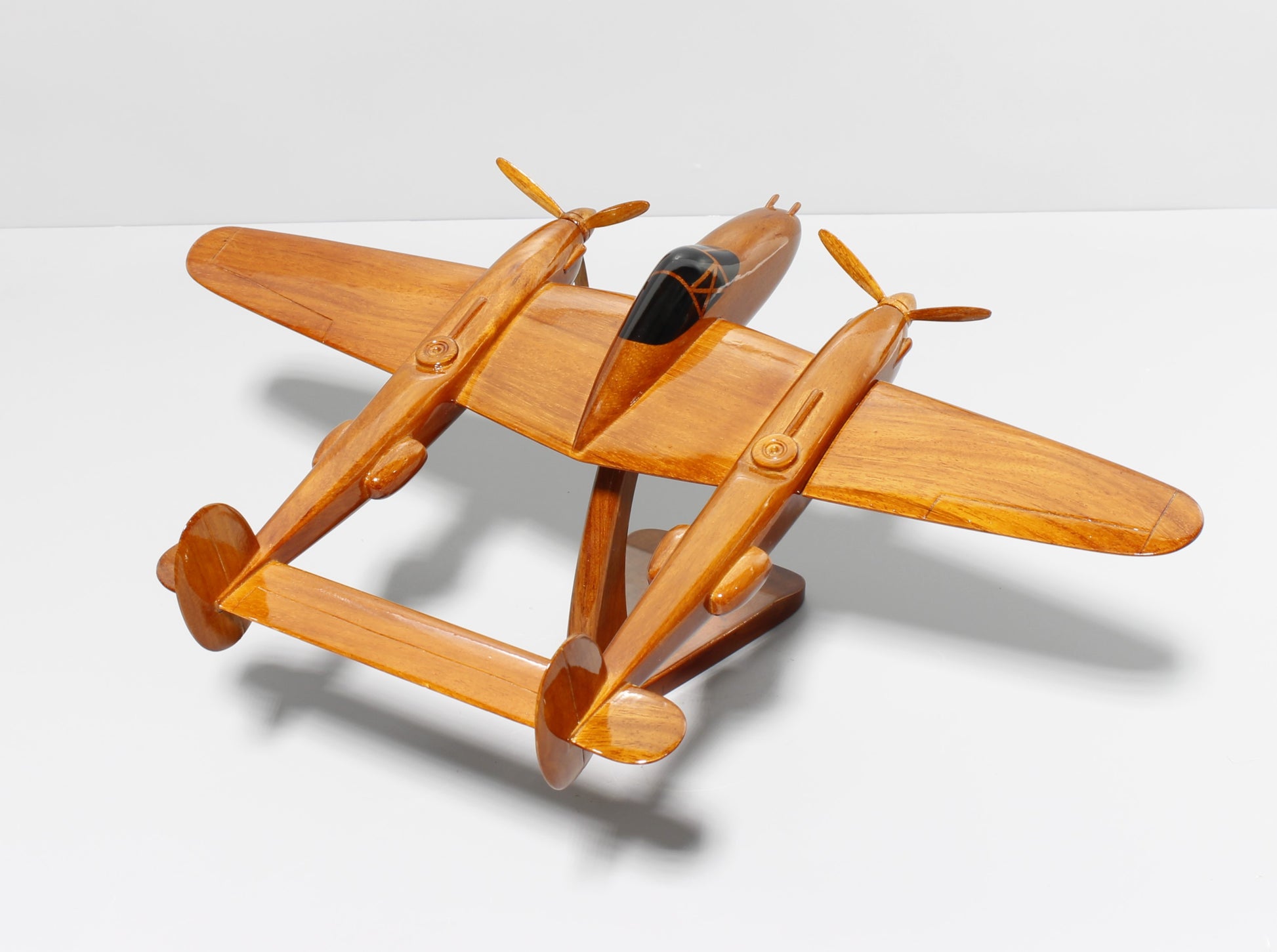 P-38 wooden model airplane with display stand