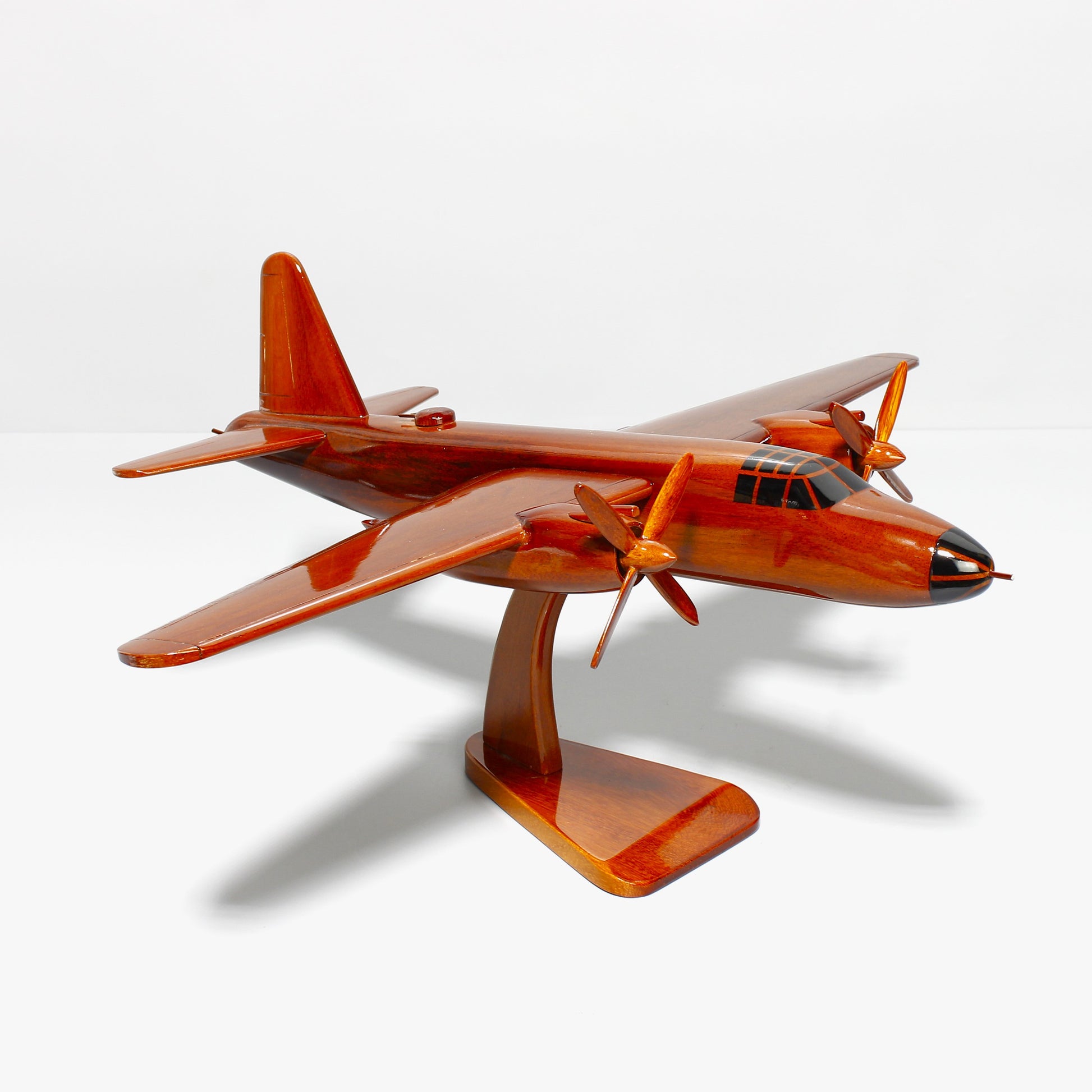 WWII B-26 bomber replica on wooden display stand