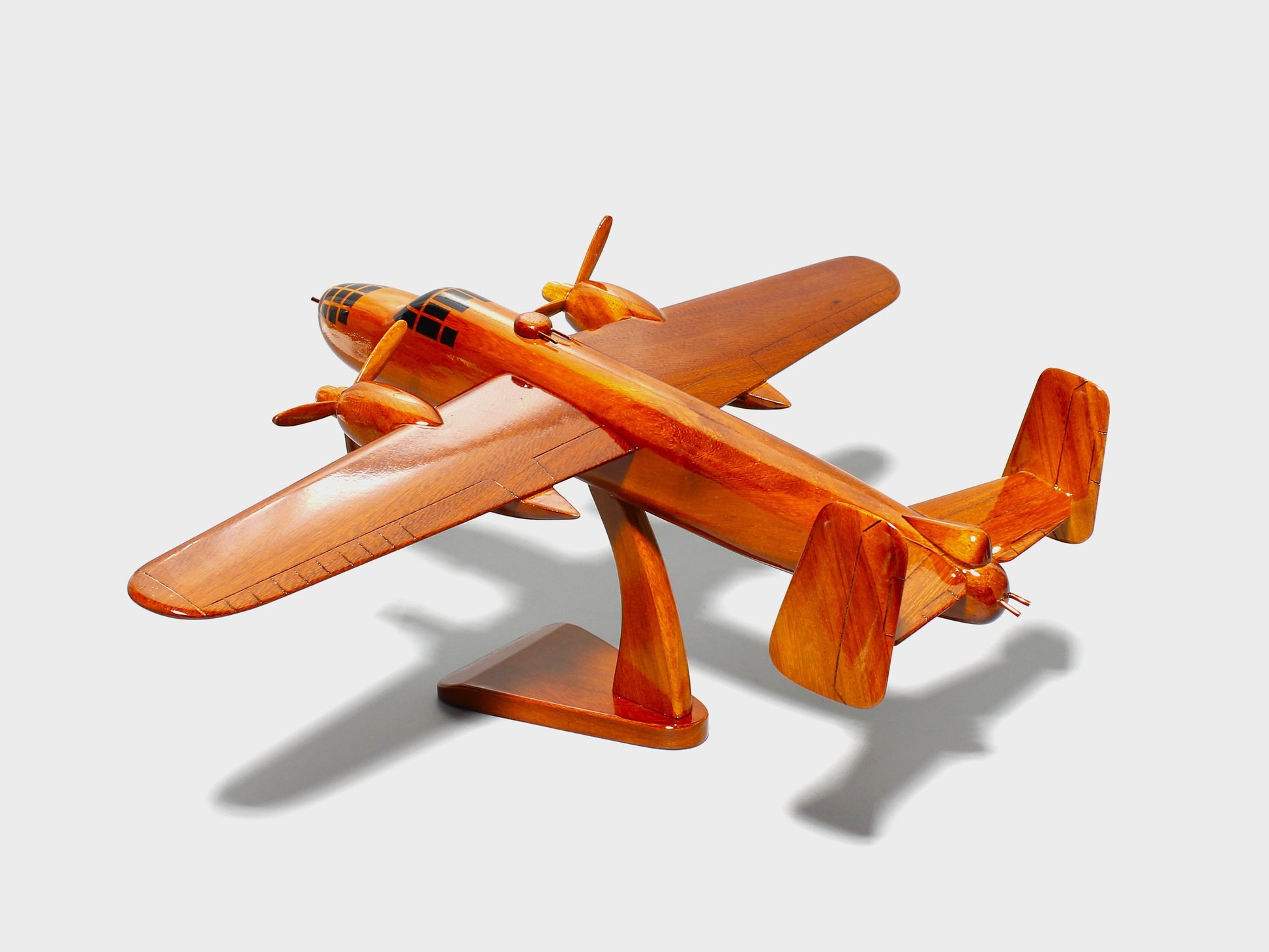 Polished WWII B-25 bomber wood replica with twin tail