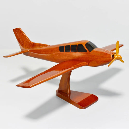 Handcrafted wooden airplane model of the Bonanza Straight Tail – Premiumwoodart