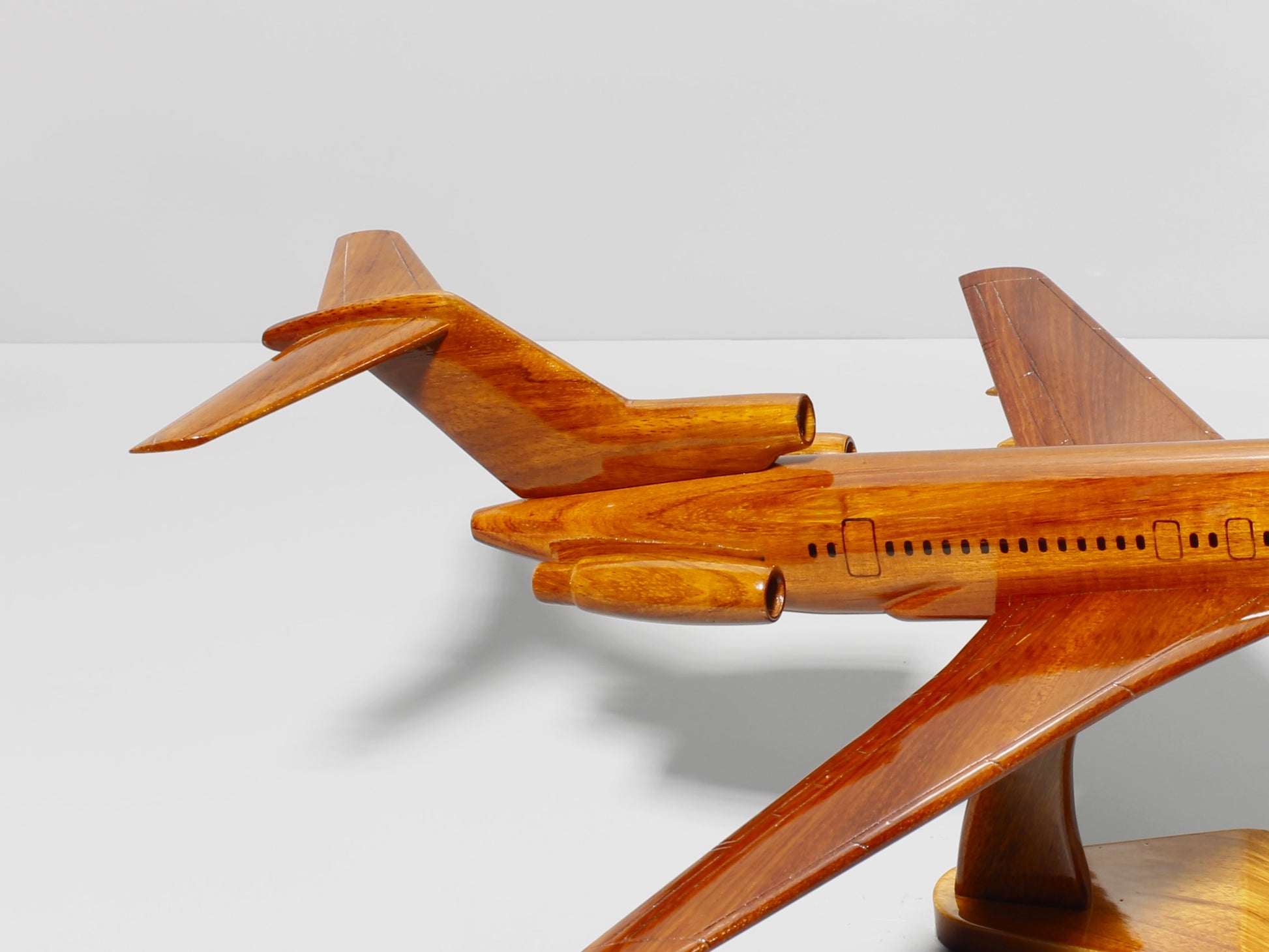 Tail detail of Boeing 727 wood aircraft model – handcrafted finish