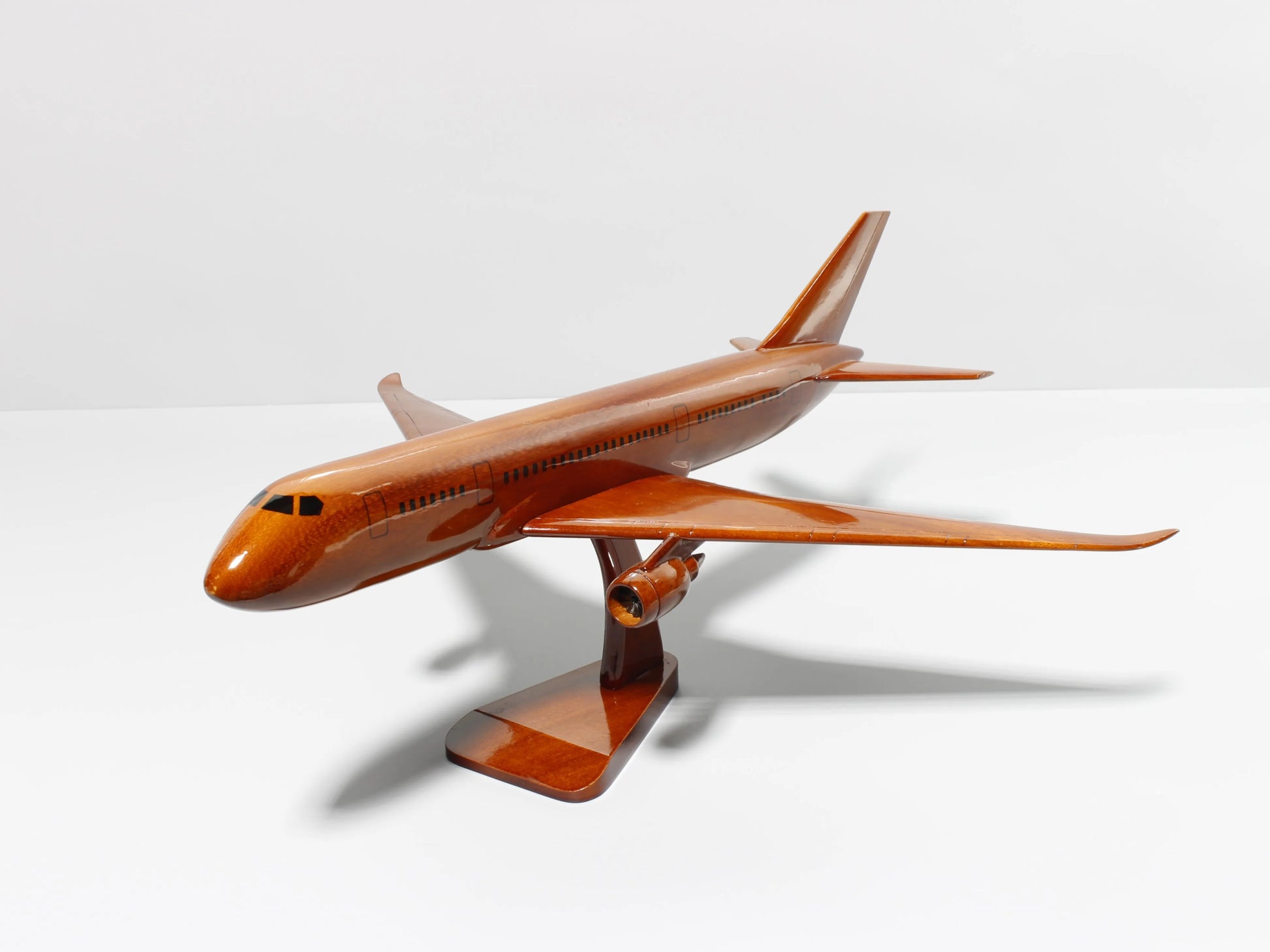 Front-right angled view of Boeing 787 wood airplane model – aviation decor