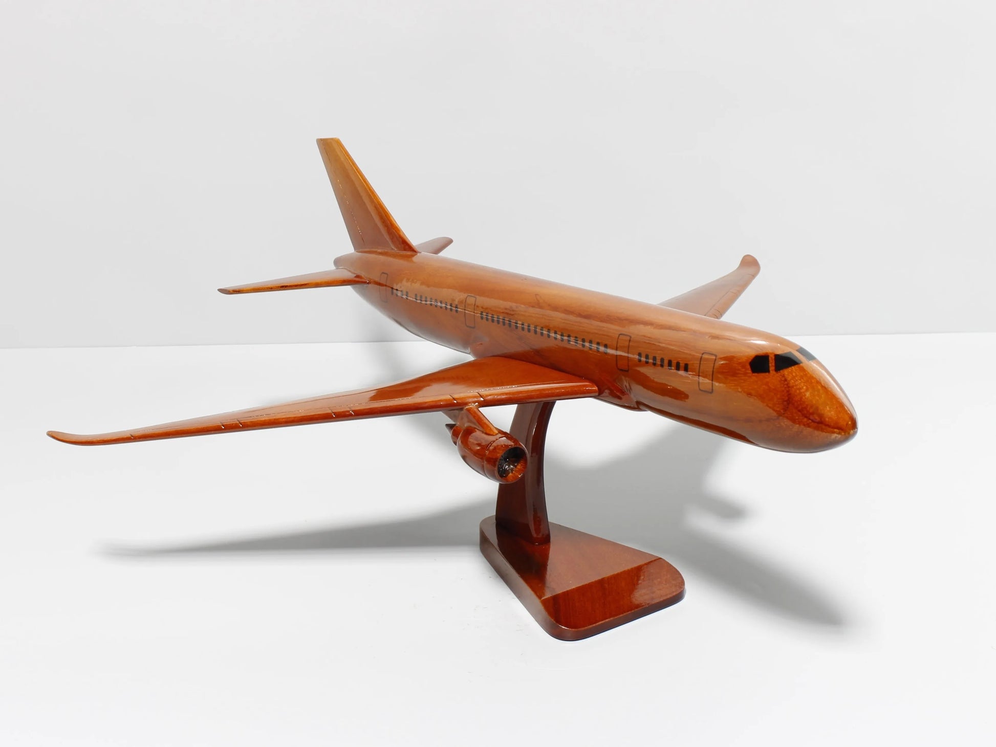 Top-front view of handcrafted Boeing 787 wooden airplane – aviation collectible