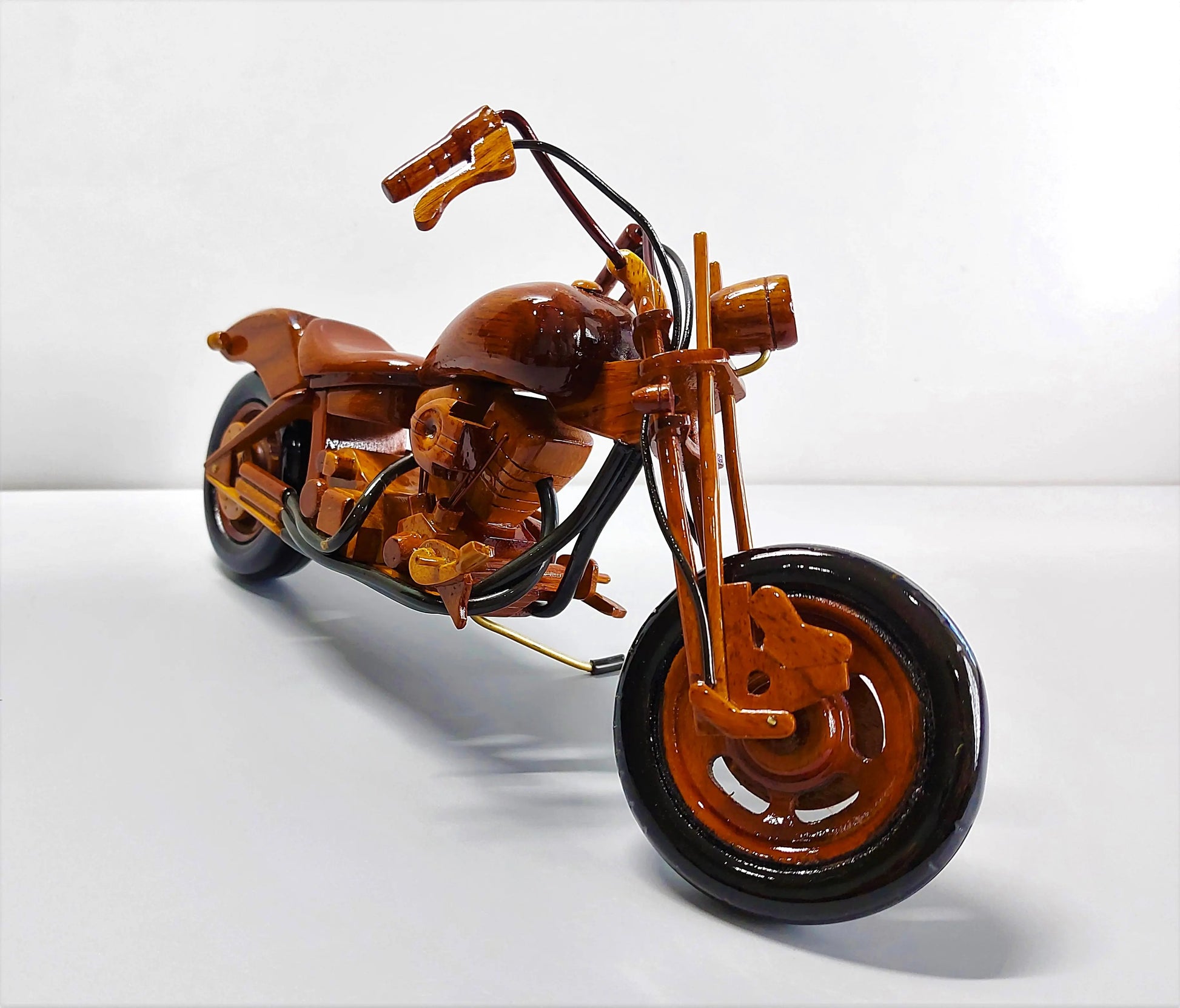 Wooden chopper motorcycle – direct front view with tall handlebars