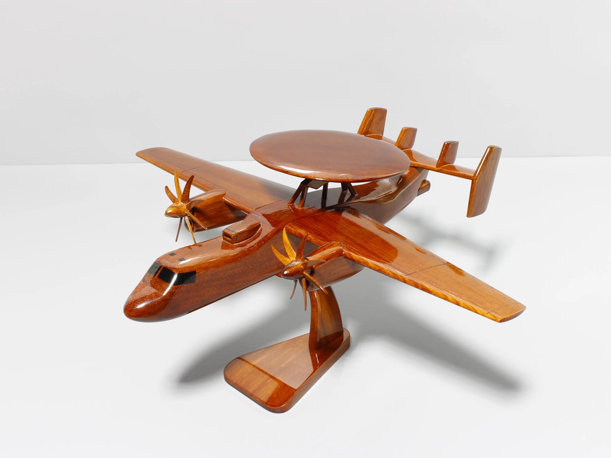 Side profile of E-2C Hawkeye wooden aircraft model showing detailed wings and fuselage – Premiumwoodart