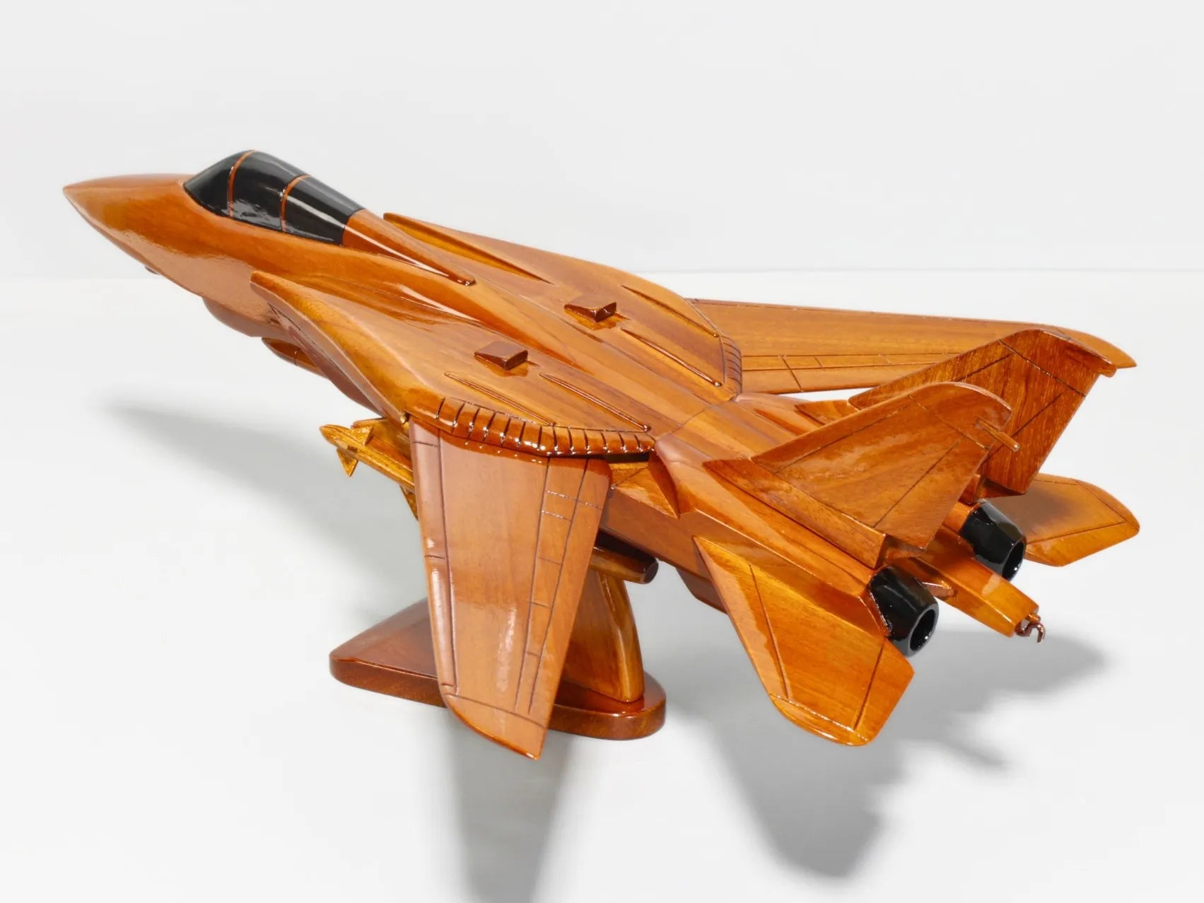 Angled left view of the F-14 Tomcat wood display model on stand