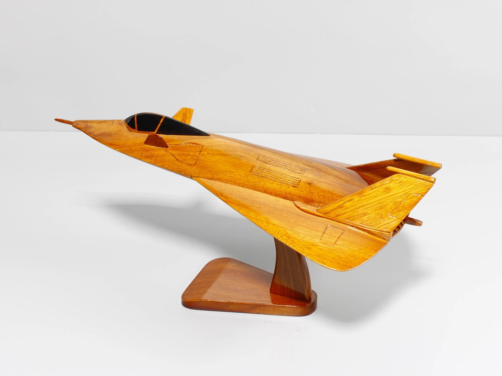 Right side view of F-19 concept jet wooden model on display stand