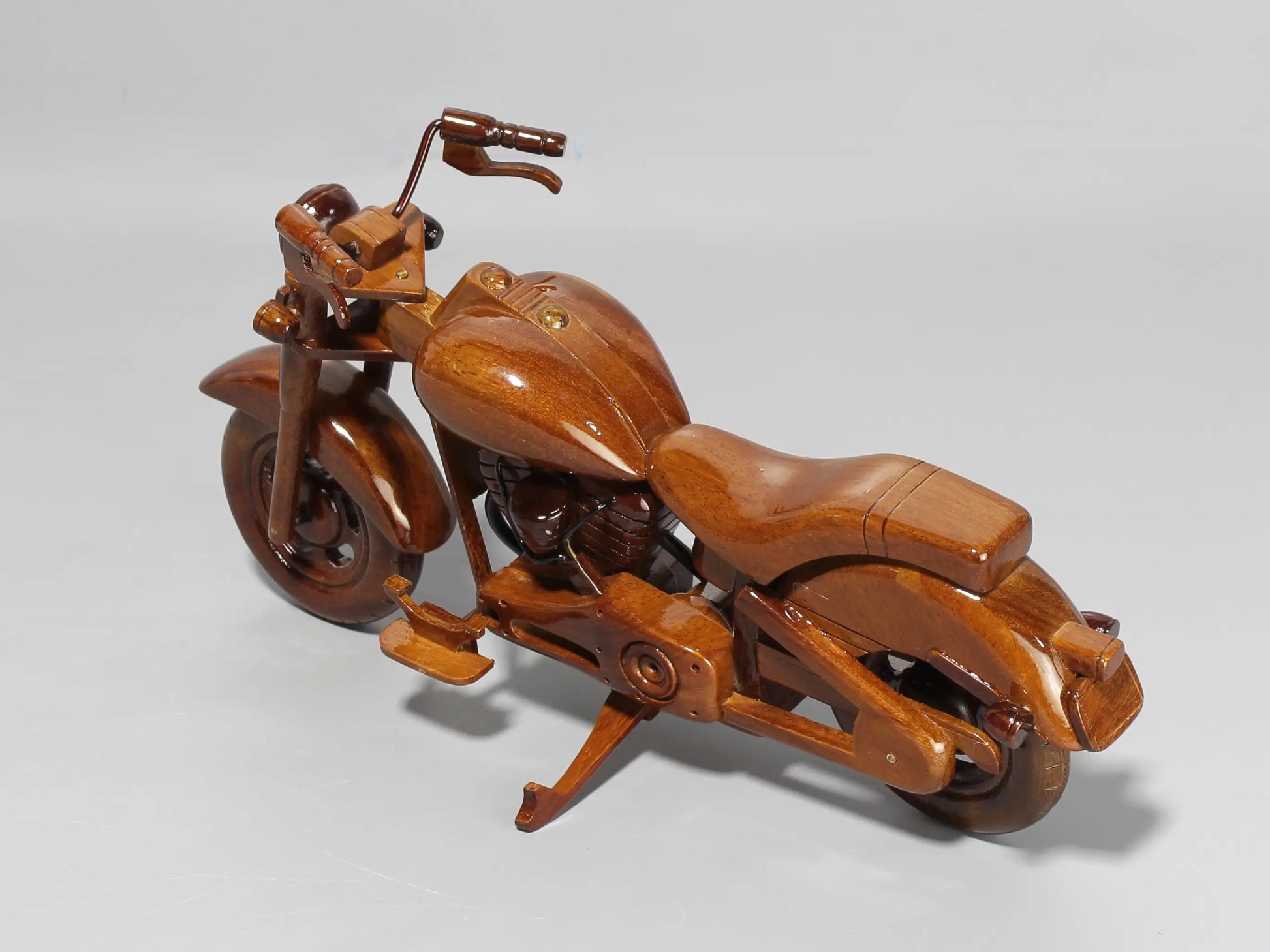 Rear view of handcrafted Harley FX wooden motorcycle – solid wood finish