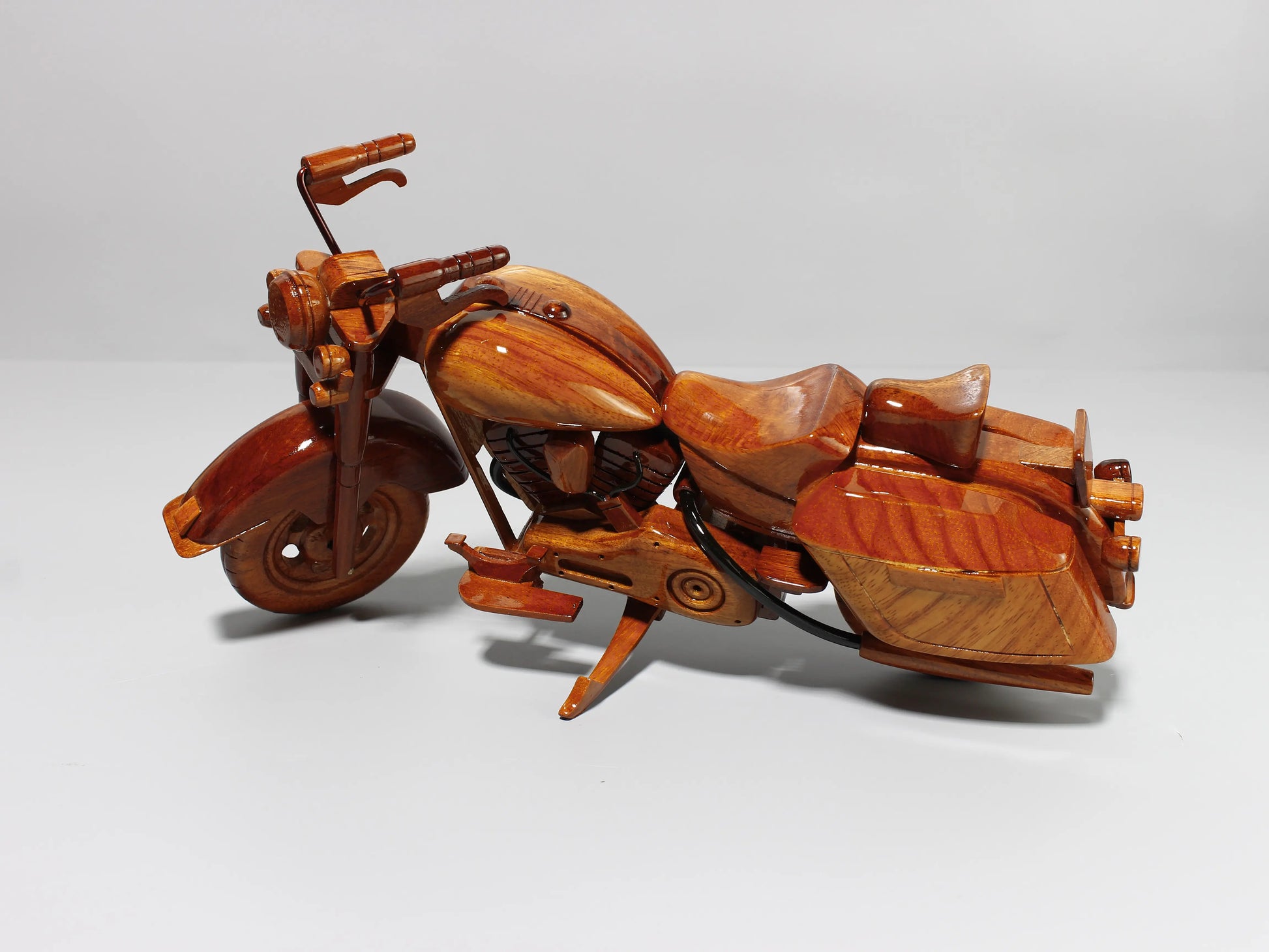 Left side of handcrafted Harley Road King wood model motorcycle