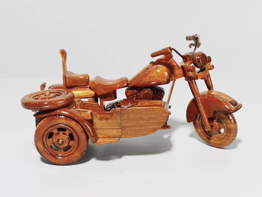 Right side of Harley sidecar wood motorcycle – vintage 3-wheel mahogany model