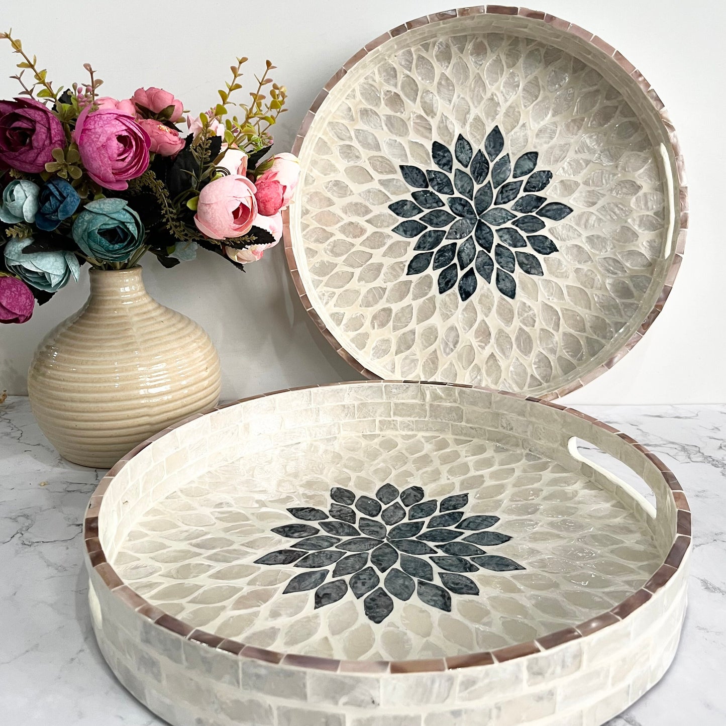 White mother of pearl inlay round tray with black floral pattern