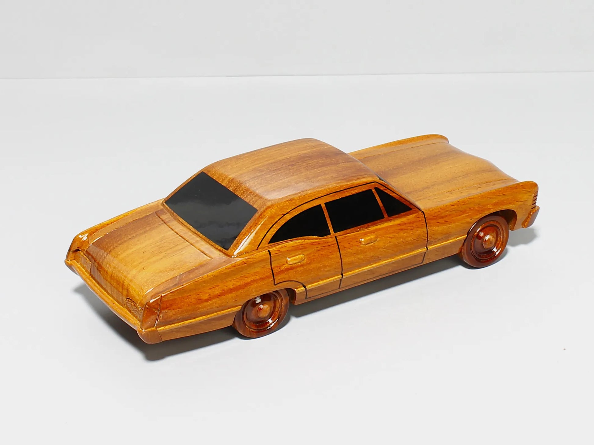 Handcrafted Impala wood car – rear right view of trunk and bumper