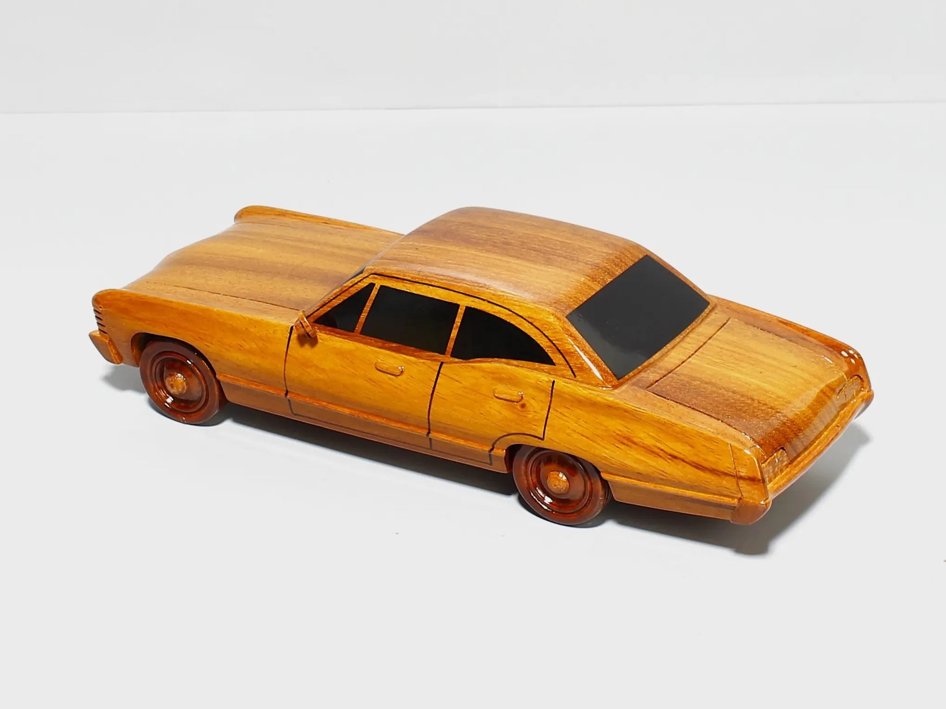 Classic Impala wood model – left profile with smooth body line