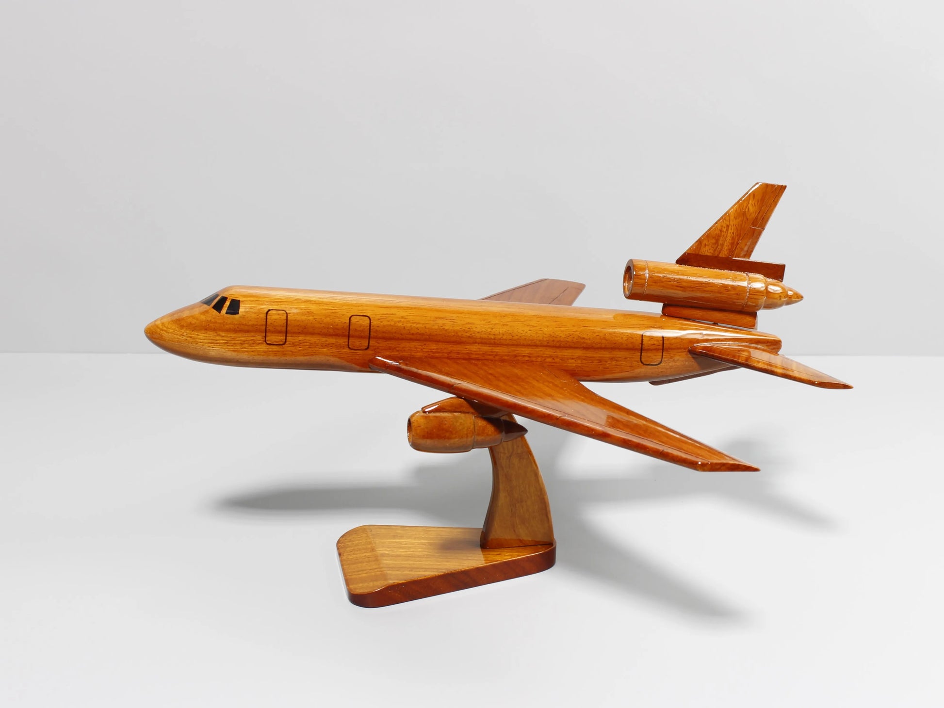 KC-10 aircraft model carved from solid mahogany with realistic refueling features – Premiumwoodart