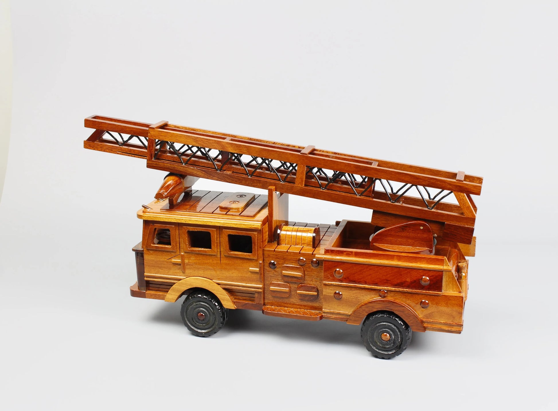 Back angle of wooden fire truck – vintage ladder truck replica