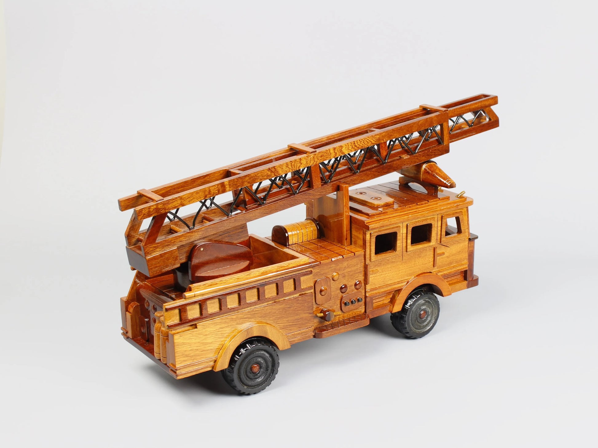 Rear view of mahogany fire truck model – carved storage compartments