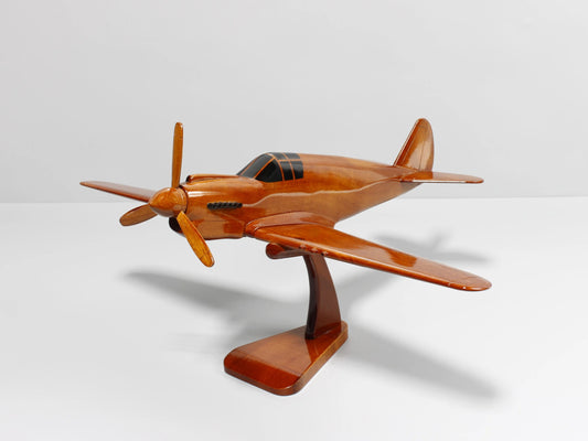 Front view of handcrafted P-40 Warhawk wood model fighter aircraft on display stand – Premiumwoodart
