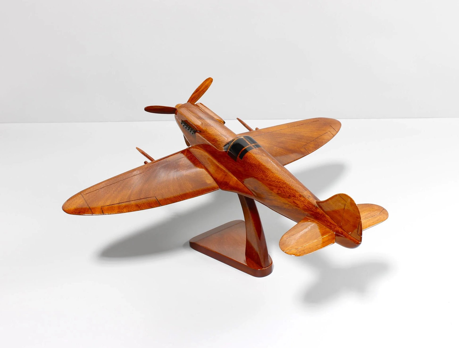Collector’s view of handcrafted Spitfire wooden plane with detailed wings – Premiumwoodart