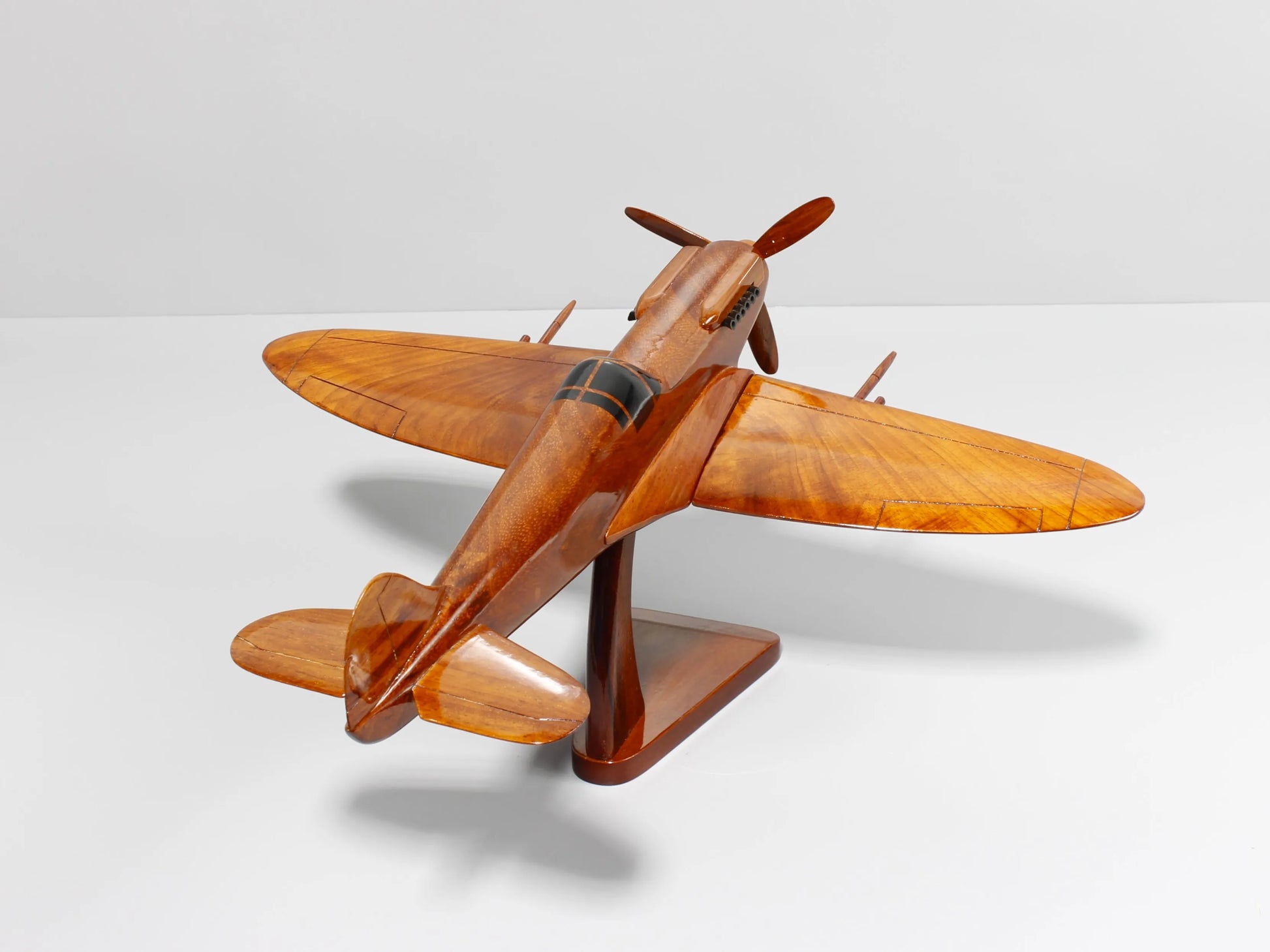 Historical wooden Spitfire model plane with signature tail and wings – Premiumwoodart