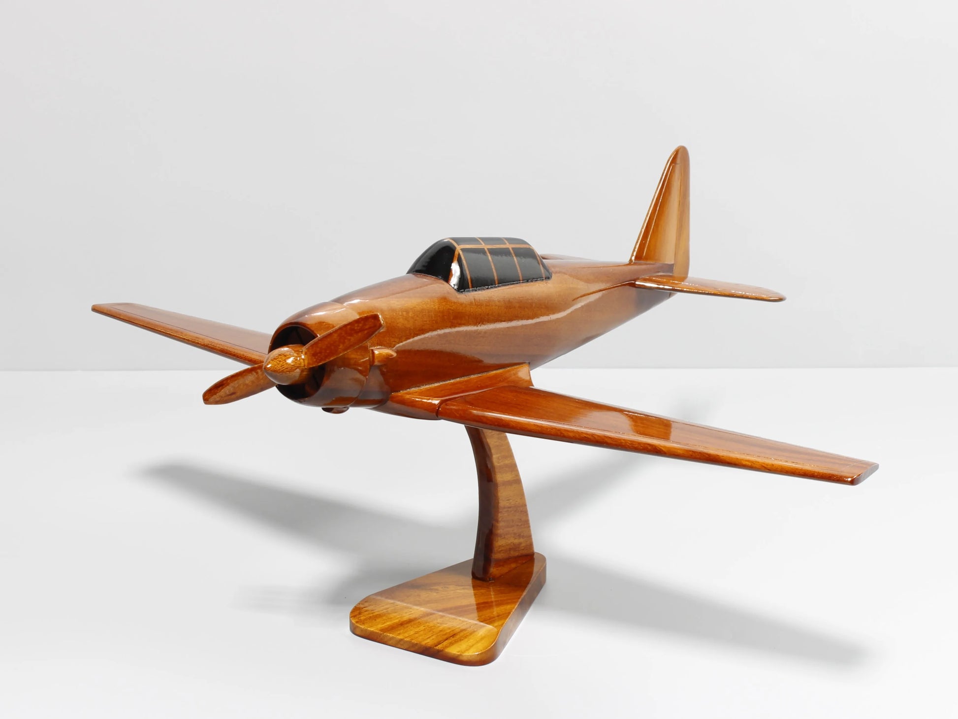 Angled side view of T-6 Texan wood model with canopy and low-wing design – Premiumwoodart