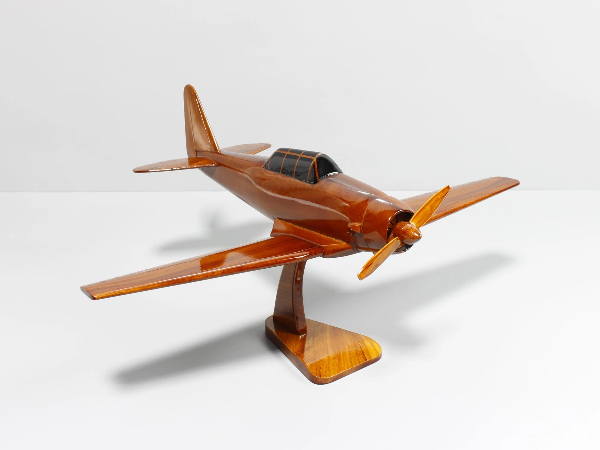 Handcrafted T-6 Texan plane model in flight-ready posture on wooden base – Premiumwoodart