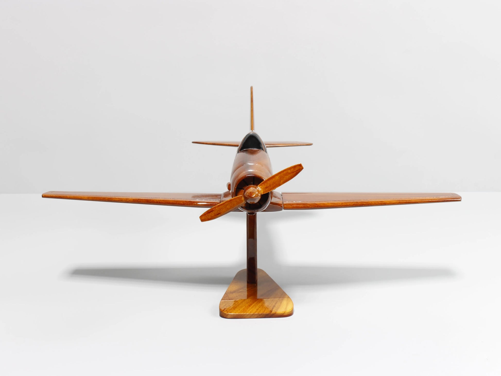 Frontal view of T-6 Texan handcrafted wood model on display stand – Premiumwoodart