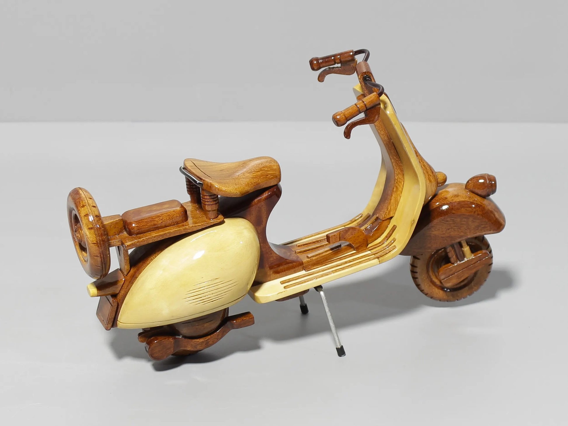 Rear perspective of handcrafted Vespa wooden motorbike
