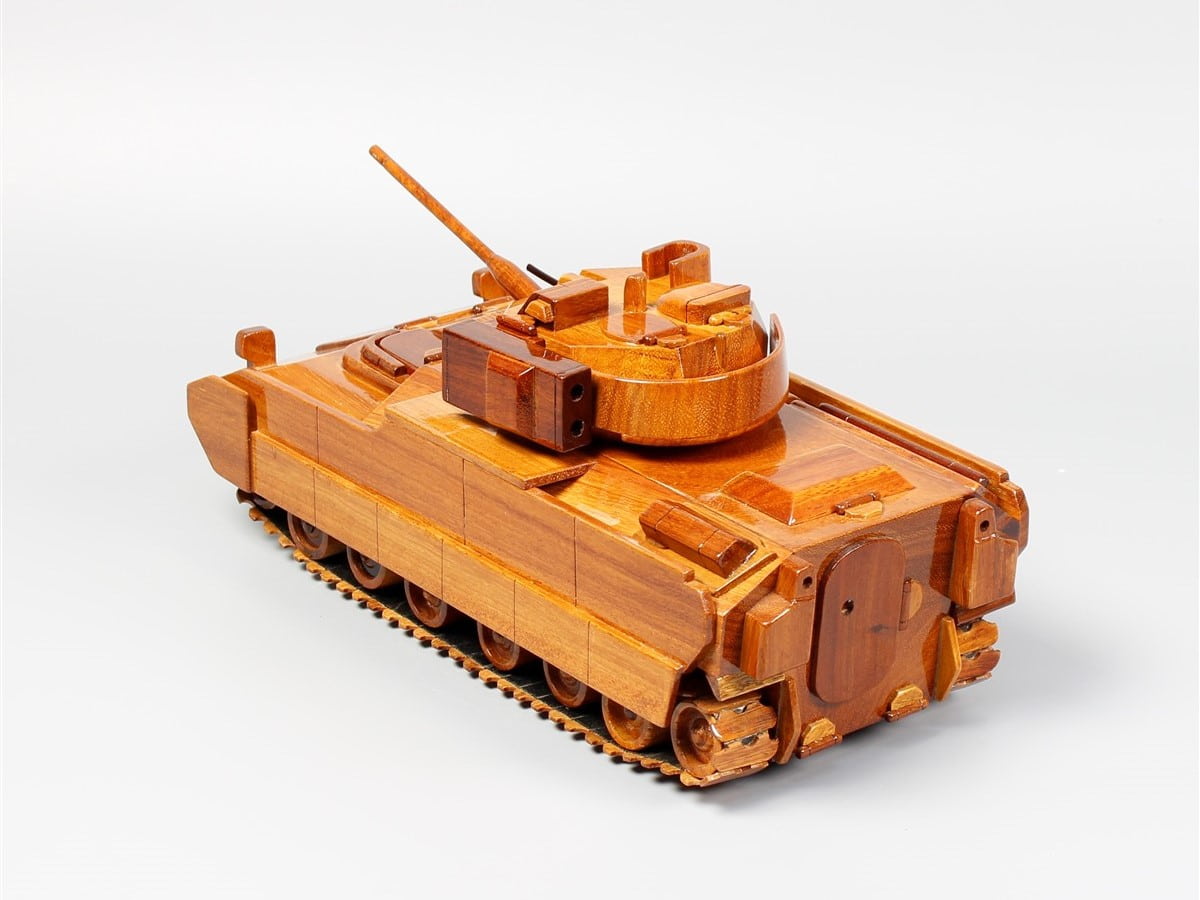 Wooden M2 Bradley Fighting Vehicle, a testament to United Defense engineering, perfect for gifting to American veterans or military enthusiasts.