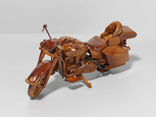Left profile of handmade Harley Electra Glide wooden motorcycle with saddlebags – collector piece