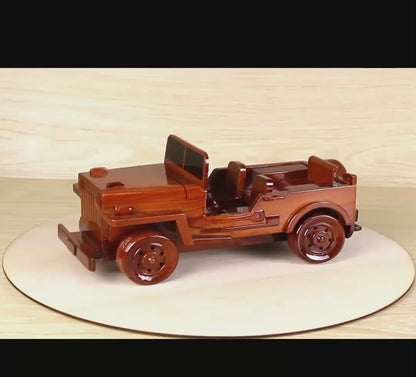 Hand-crafted wooden model of the 1951 Willys M38 Army Jeep, a classic symbol of U.S. military history.